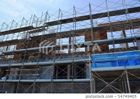 Construction site scaffolding 54749405