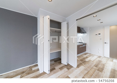 Apartment renovation image living and closet open 54750208