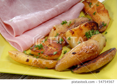 Plate with ham and potatoes Plate with ham and potatoes 54754567