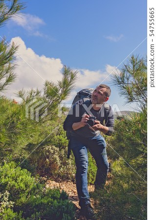 Professional wildlife photographer in the wild Professional wildlife photographer in the wild 54755665