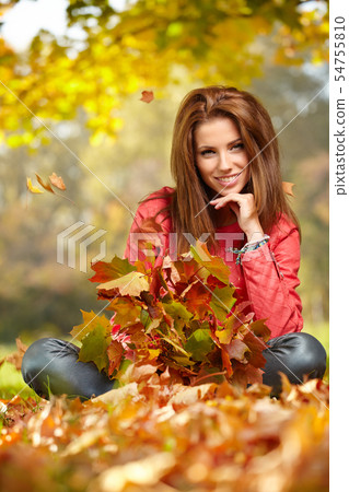 Fall woman- Autumn portrait of happy lovely and 54755810