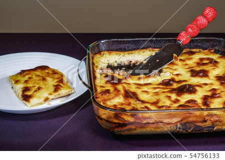 Greek moussaka dish recipe preparation. Greek moussaka dish recipe preparation. 54756133