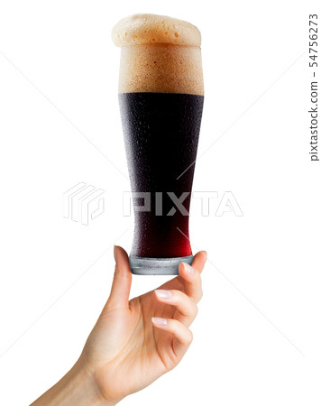 Woman hand holding mug of beer with foam on white background 54756273
