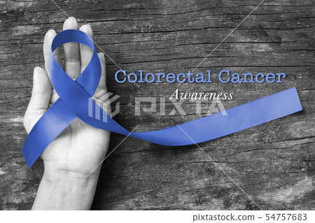 Colon cancer awareness with dark blue ribbon 54757683
