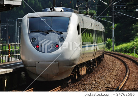 Express Thunderbird (system 681) passing Hokuriku Main Line and Minami-Imanada Station Express Thunderbird (system 681) passing Hokuriku Main Line and Minami-Imanada Station 54762596