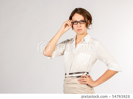 Portrait of young student with glasses Portrait of young student with glasses 54763928