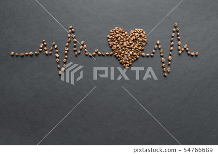 A cardiogram of coffee beans on a black background 54766689