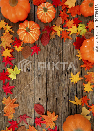 Autumn leaves on wooden background Autumn leaves on wooden background 54769458