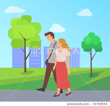 Male and Female Walk Together in Green City Park 54769938