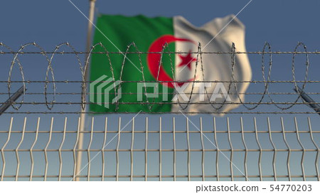 National flag of Algeria behind barbed wire fence. Conceptual 3D rendering National flag of Algeria behind barbed wire fence. Conceptual 3D rendering 54770203