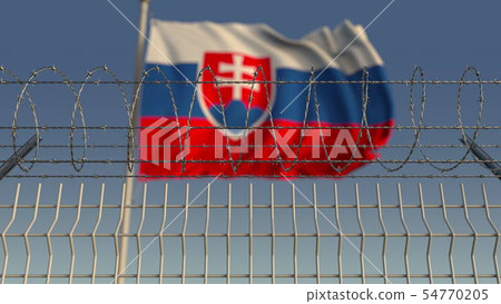 Many waving flag of Slovakia behind barbed wire fence. Conceptual 3D rendering Many waving flag of Slovakia behind barbed wire fence. Conceptual 3D rendering 54770205