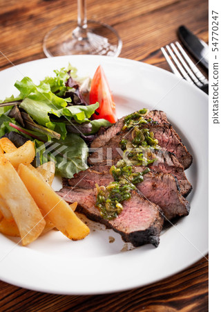 grilled tri tip steak with green onion sauce 54770247