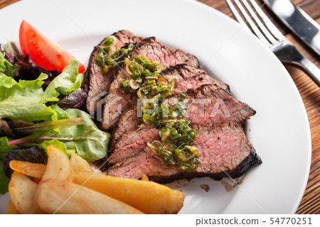 grilled tri tip steak with green onion sauce grilled tri tip steak with green onion sauce 54770251