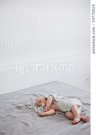 newborn baby sleeps dummy bedroom covered blanket 54770828