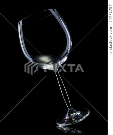 Empty glass for red wine isolated on black background. 54771797