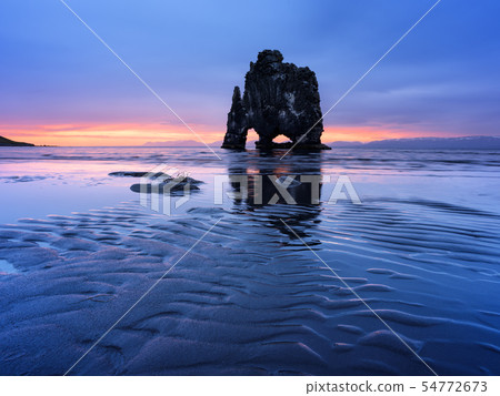 Hvitserkur cliff and ocean ebb in Iceland 54772673