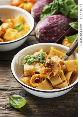 pasta calamarata with vegetarian sauce pasta calamarata with vegetarian sauce 54773071