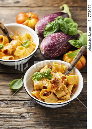 pasta calamarata with vegetarian sauce 54773072