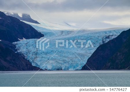 Distant view of a Holgate glacier in Kenai fjords National Park, Seward, Alaska, United States Distant view of a Holgate glacier in Kenai fjords National Park, Seward, Alaska, United States 54776427