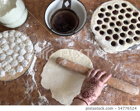 Process of homemade dumplings with cherry top view 54776524