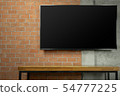 blank screen Tv on red brick wall 54777225