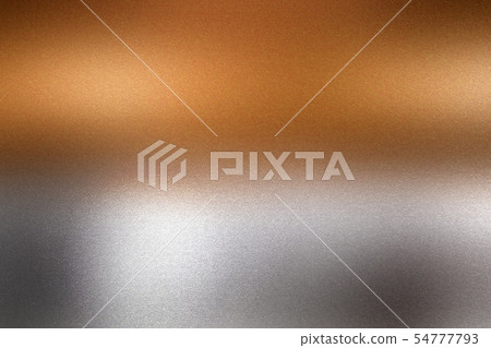 Light shining on bronze silver metallic wall in Light shining on bronze silver metallic wall in 54777793