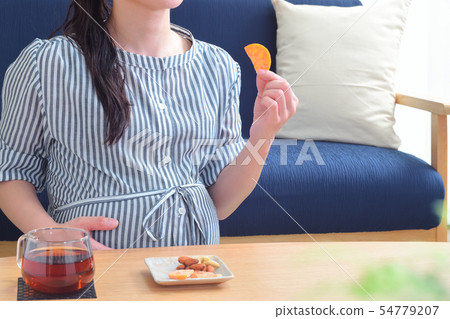 Pregnant woman's snack dried fruit orange Pregnant woman's snack dried fruit orange 54779207