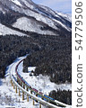 Freight train with clear snow 54779506