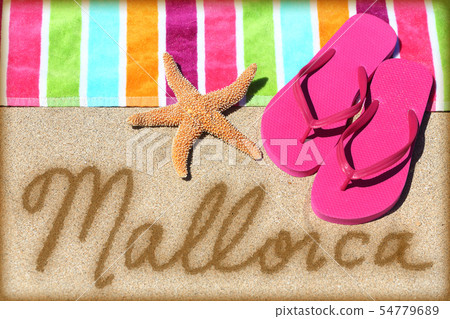 Mallorca beach vacation writing on sand 54779689