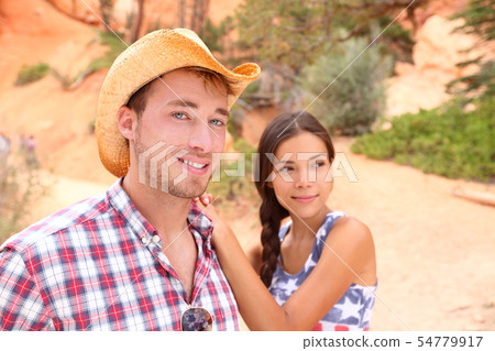 Couple portrait in american countryside outdoors. 54779917