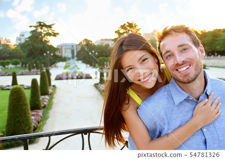 Portrait of Romantic couple embracing in love Portrait of Romantic couple embracing in love 54781326