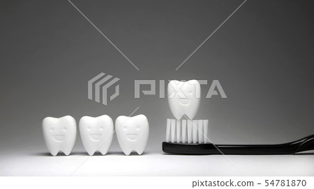 Happy Tooth and black toothbrush, teeth will good  54781870