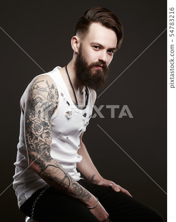 handsome man with beard. Brutal bearded hipster handsome man with beard. Brutal bearded hipster 54783216