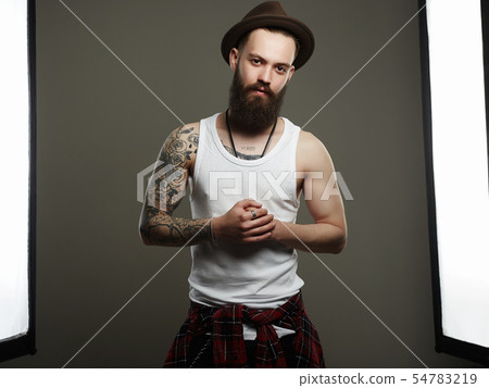 boy with tattoo. Male model in Photostudio boy with tattoo. Male model in Photostudio 54783219