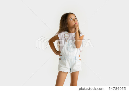 Portrait of little girl isolated on white studio background Portrait of little girl isolated on white studio background 54784955