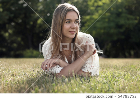 nice girl on the grass nice girl on the grass 54785752