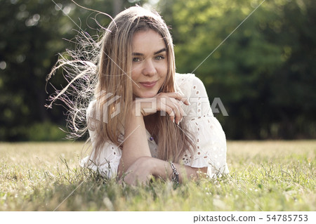 nice girl on the grass nice girl on the grass 54785753