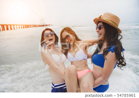 three bikini asian woman happiness with relaxing 54785901