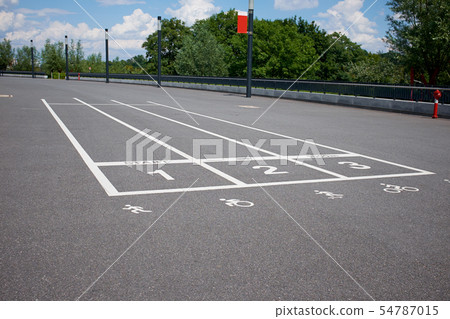 treadmill at the asphalt with the numbering and 54787015