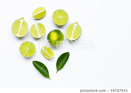 Fresh limes with leaves isolated on white Fresh limes with leaves isolated on white 54787641