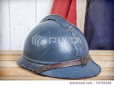 french helmet and old french flag 54788480