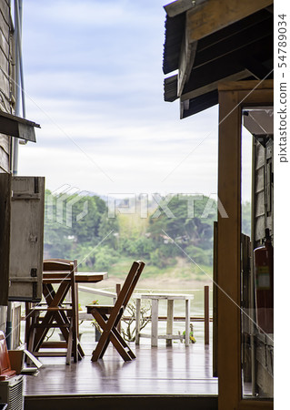 Wooden chairs on the balcony. Wooden chairs on the balcony. 54789034