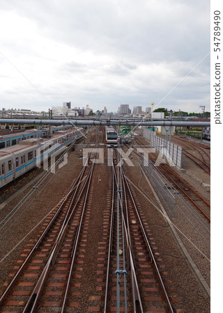 Chuo Line coming and going near Mitaka vehicle center Chuo Line coming and going near Mitaka vehicle center 54789490