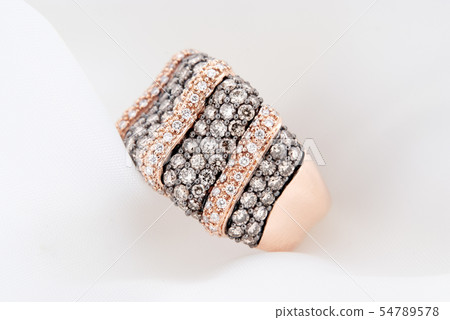 Rose Gold Ring With Diamonds On Soft White 54789578