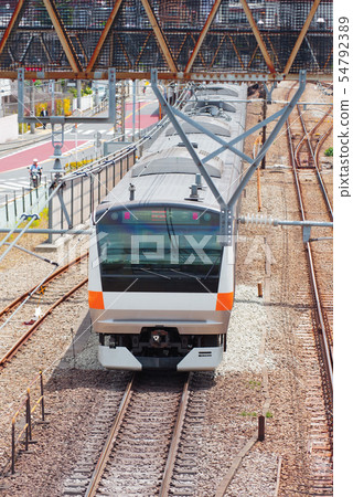 Chuo Line coming and going near Mitaka vehicle center Chuo Line coming and going near Mitaka vehicle center 54792389