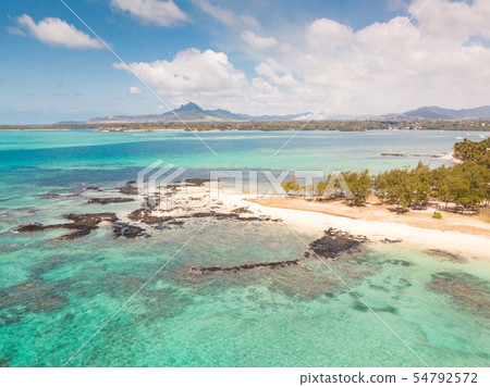 Aerial view of beautiful tropical beach with turquoise sea. Tropical vacation paradise destination 54792572