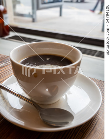 Americano coffee in white cup Americano coffee in white cup 54794106