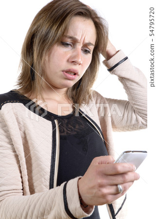 young woman with a problem on the phone 54795720