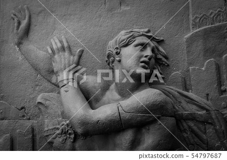 Figure of angel as a symbol of love, kindness, and suffering 54797687