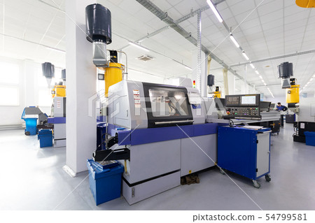 an interior shot of producing line of metal parts in modern plant 54799581